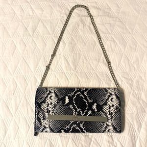 Guess shoulder clutch purse.